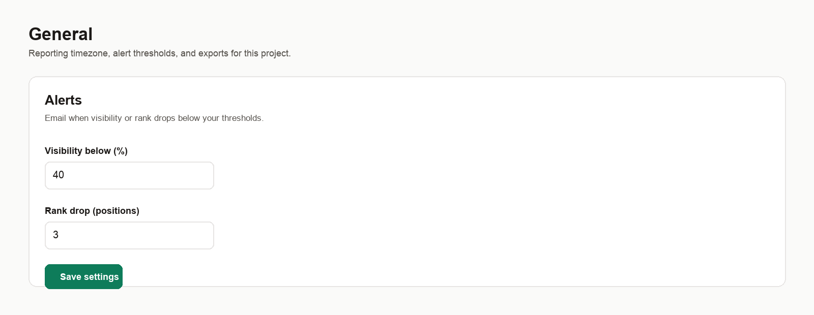 Project settings alert threshold section with percentage input and save button